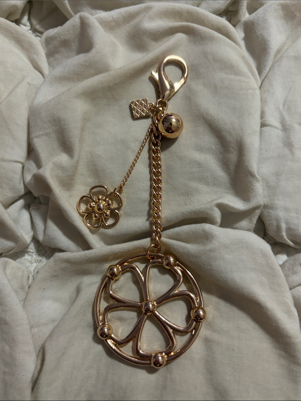 Free People Gold Tone Open Floral Medallion Charm Bag Charm Keychain Boho Chic